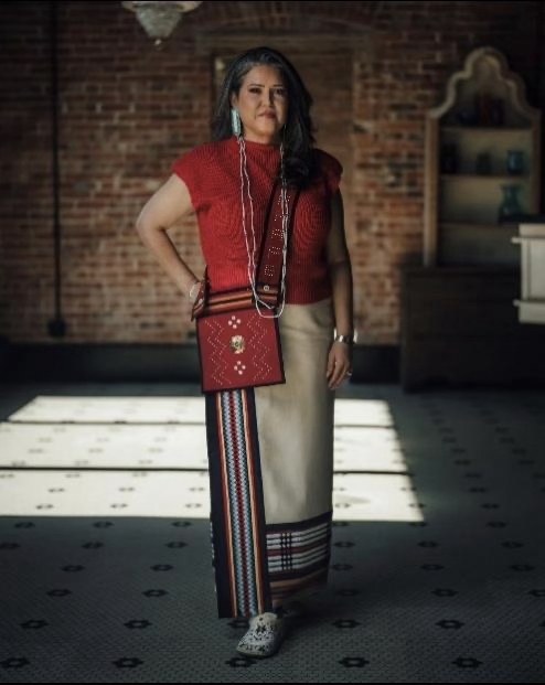 Leslie Jerden standing in Teton Trade Cloth by Lenape apparel