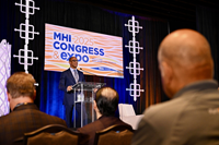 U.S. Department of Housing and Urban Development (HUD) Secretary Scott Turner speaking at MHI Congress & Expo in Orlando, Fla.